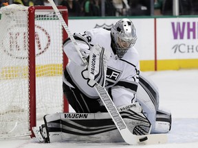 Los Angeles Kings goalie Darcy Kuemper blocks a shot from Tuesday, Jan. 30, 2018, in Dallas. (AP Photo/Tony Gutierrez)