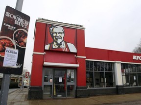 A closed sign is seen outside a KFC restaurant near Ashford, England, Monday, Feb. 19, 2018. Fast-food chain KFC has been forced to close most of its 900 outlets in Britain and Ireland because of a shortage of chicken The company is blaming "teething problems" with its new delivery partner, DHL. The company first apologized for the problems on Saturday. In an update Monday, it listed more than 200 stores as open, but did not say when the rest might reopen. (Gareth Fuller/PA via AP
