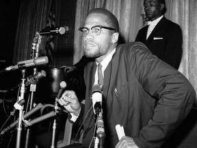 FILE - In this Feb. 13, 1963 file photo, Nation of Islam leader Malcolm X speaks to the press in New York as Muslims were picketing through the Times Square area. A Smithsonian Channel series, "The Lost Tapes: Malcolm X," examining the life of civil right leader Malcolm X, follows the advocate's changing philosophy using his own words as a Nation of Islam surrogate to a figure seeking to build coalitions during the tumultuous 1960s civil rights era.