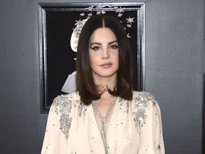 FILE - In this Jan. 28, 2018 file photo, Lana Del Rey arrives at the 60th annual Grammy Awards in New York. A Florida man is in jail for allegedly threatening to kidnap pop singer Del Rey before a concert. Orlando Police said officers arrested 43-year-old Michael Shawn Hunt of Riverview on Friday night outside the Amway Center where she was performing.