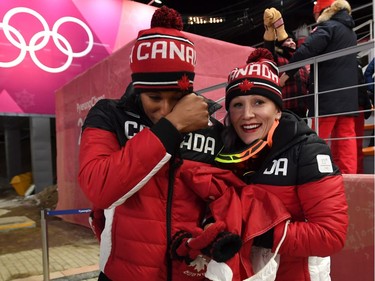 Canada driver Kaillie Humphries and Phylicia George react after winning the bronze medal in women's bobsled finals during 2018 Winter Olympics in Pyeongchang, South Korea, on Wednesday Feb. 21, 2018.