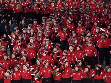 Canada's pump is primed for the podium at the 2022 Winter Olympics, according to one of the country's top sports officials. Canadian athletes enter the stadium during the closing ceremonies at the 2018 Pyeongchang Olympic Winter Games in Pyeongchang, South Korea, on Sunday, February 25, 2018.