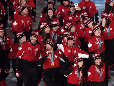 Canadian athletes enter the stadium during the closing ceremonies at the 2018 Pyeongchang Olympic Winter Games in Pyeongchang, South Korea, on Sunday, February 25, 2018.