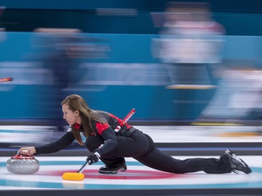 Canada's skip Rachel Homan delivers a shot as they face Switzerland during preliminary round in women's curling at the Pyeongchang 2018 Olympic Winter Games in Gangneung, South Korea, on Sunday, February 18, 2018.