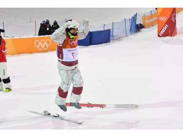 Canadian Mikael Kingsbury celebrates after winning the men's moguls at the 2018 Winter Olympic Games at Phoenix Snow Park in Pyeongchang, South Korea, Monday, Feb. 12, 2018.