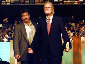 Rev. Billy Graham arrives on stage during A Concert for the Next Generation at the Corel Centre.