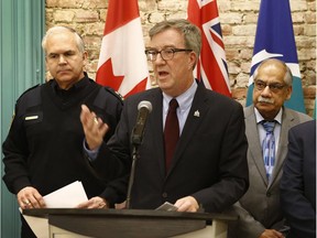 Ottawa Mayor Jim Watson, joined by Ottawa Police Chief Charles Bordeleau, provided an update on the Ottawa Street Violence and Gang Strategy at City Hall in Ottawa Friday Jan 26, 2018.  Tony Caldwell