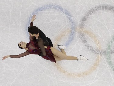 Tessa Virtue and Scott Moir, of Canada, perform in the ice dance free dance figure skating team event in the Gangneung Ice Arena at the 2018 Winter Olympics in Gangneung, South Korea, Monday, Feb. 12, 2018. Canada won the gold medal.