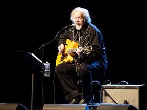 Randy Bachman peforms on stage while hosting the Juno Songwriters' Circle held at the Burton Cummings Theatre in Winnipeg, Man. on Sun., March 30, 2014. (Brook Jones/QMI Agency)