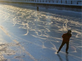 Skaters make their way along the Rideau Canal Skateway shortly after dawn on Sunday, Jan. 15, 2017 in Ottawa.