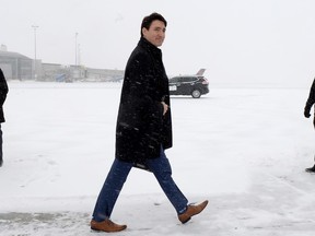 Prime Minister Justin Trudeau is putting federal government lawyers on notice over their response to a proposed class-action lawsuit on sexual harassment and misconduct in the military. Prime Minister Justin Trudeau walks across the tarmac to board the government airplane on his way to Chicago, in Ottawa on Wednesday, February 7, 2018.