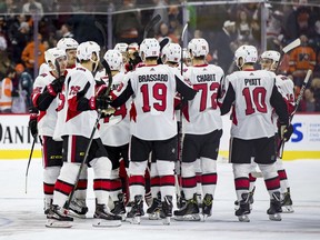 After the shootout, the Ottawa Senators celebrate the win over the Philadelphia Flyers on Saturday, Feb. 3, 2018 in Philadelphia.