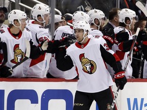 Twenty-one-year-old Colin White (36) celebrates a Senators goal during a game against the Penguins on Feb. 13. White was reassigned to Belleville of the AHL on Friday, but could be back if, as expected, the Senators trade a veteran forward or two before the deadline on Feb. 26.