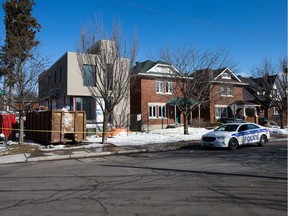 Police guard the scene at the corner of Western and Spencer Streets.  Police responded to reports of a stabbing on Carleton and Wellington Street West at around 6:45 p.m., on Sunday evening .