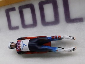In this Feb. 9, 2014 file photo, Albert Demchenko competes in luge at the Sochi Olympics.