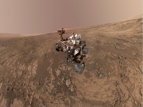 This composite image made from a series of Jan. 23, 2018 photos shows a self-portrait of NASA's Curiosity Mars rover on Vera Rubin Ridge. The rover's arm which held the camera was positioned out of each of the dozens of shots which make up the mosaic.