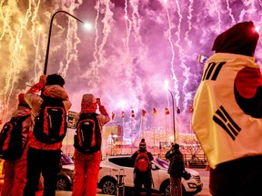 Fireworks go off at the start of the opening ceremony at the Pyeongchang Olympics on Feb. 9.