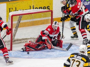 Ottawa 67's goalie Olivier Tremblay sticks out a pad on his way to a 33-save performance against the Kingston Frontenacs on Wednesday, Feb. 14, 2018 at the TD Place  arena