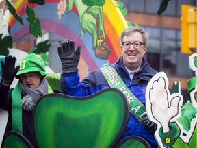 Mayor Jim Watson waves during the St. Patrick's Day parade on March 10, 2018. The parade receives money each year from the city's protocol office.