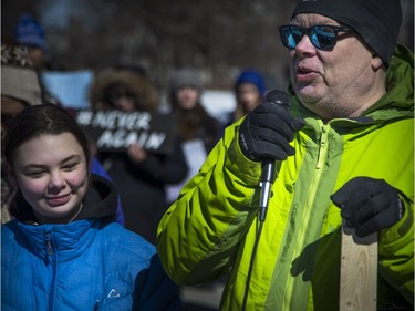 March For Our Lives Ottawa started on Parliament Hill Saturday March 24, 2018, making its way over to Major's Hill Park. People of Ottawa took to the streets joining with others all over North America to demand lives and safety become a priority and to end gun violence and mass shootings in schools. Jim O'Flaherty spoke from the heart of an experience he went through at the school his child went to. O'Flaherty has his daughter 14-year-old Ceara beside him.   Ashley Fraser/Postmedia