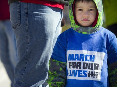 March For Our Lives Ottawa started on Parliament Hill Saturday March 24, 2018, making its way over to Major's Hill Park. People of Ottawa took to the streets joining with others all over North America to demand lives and safety become a priority and to end gun violence and mass shootings in schools.  Four-year-old Felix Stewart-Troy wearing a shirt March For Our Lives.