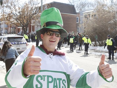 Joe Harrington, a University of Ottawa student, takes part in a St. Patrick's Day party on Russell Avenue in Sandy Hill a on Saturday, March 17, 2018.