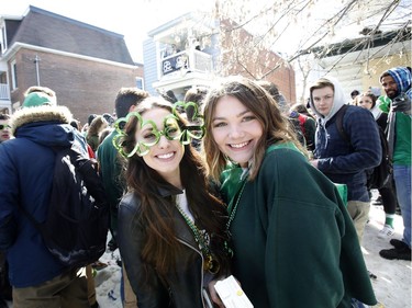 Revellers take part in a St. Patrick's Day party on Russell Avenue in the Sandy Hill Neigbourhood of Ottawa on Saturday, March 17, 2018.