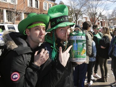 Revellers take part in a St. Patrick's Day party on Russell Avenue in the Sandy Hill Neigbourhood of Ottawa on Saturday, March 17, 2018.