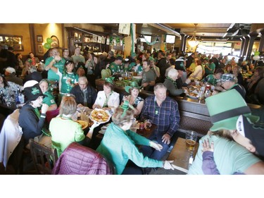 Revellers celebrate at D'Arcy McGee's in Kanata on St. Patrick's Day, Saturday, March 17, 2018.