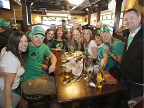 Revellers celebrate at D'Arcy McGee's in Kanata on St. Patrick's Day, Saturday, March 17, 2018.