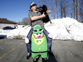 Jordan Scott plays bagpipes in Kanata on St. Patrick's Day, Saturday, March 17, 2018.