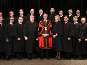 Coun. Diane Deans stands to the right of Mayor Jim Watson in this official portrait of city council.