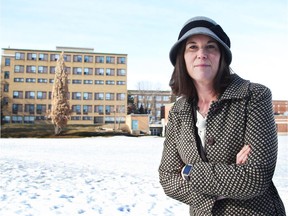 Joanne Lostracco stands on the field of Immaculata HS in Ottawa.