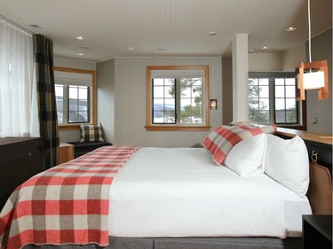 Bedrooms at the small hotel include incredible views of the Gatineau Hills.