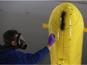 The submarine scale model is painted on to see the effects of the wind tunnel in Ottawa, March 19, 2018. Photo by Jean Levac/Postmedia  128781