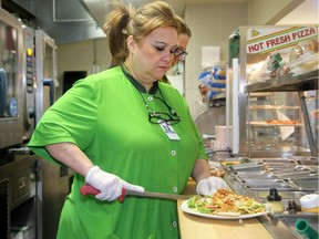 Agnes Leduc prepares a healthy Thai Chicken Wrap with Pita inside the cafeteria at the Queensway Carleton Hospital Monday (March 26, 2017).