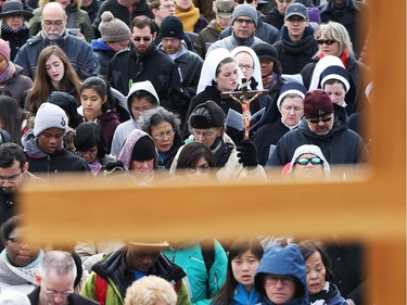 Way of the Cross through the streets of Ottawa, led by the Most Reverend Terrence Prendergast SJ, Archbishop of Ottawa stopped on Parliament Hill in Ottawa, March 30, 2018.  Photo by Jean Levac/Postmedia   128864