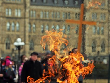 Way of the Cross through the streets of Ottawa, led by the Most Reverend Terrence Prendergast SJ, Archbishop of Ottawa stopped on Parliament Hill in Ottawa, March 30, 2018.  Photo by Jean Levac/Postmedia   128864