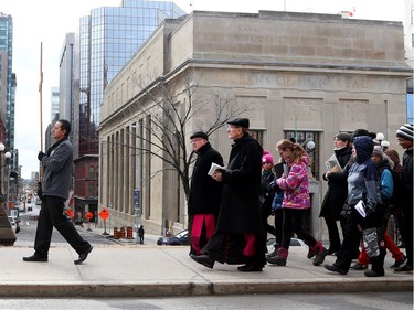 Way of the Cross through the streets of Ottawa, led by the Most Reverend Terrence Prendergast SJ, Archbishop of Ottawa stopped on Parliament Hill in Ottawa, March 30, 2018.  Photo by Jean Levac/Postmedia   128864