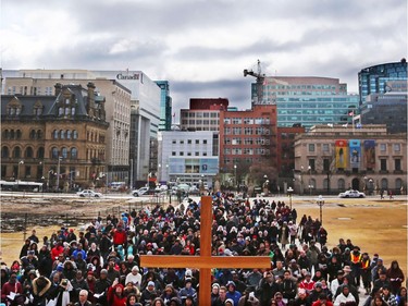 Way of the Cross through the streets of Ottawa, led by the Most Reverend Terrence Prendergast SJ, Archbishop of Ottawa stopped on Parliament Hill in Ottawa, March 30, 2018.  Photo by Jean Levac/Postmedia   128864