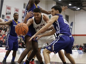 Forward Eddie Ekiyor, seen here in last Saturday's conference final against Ryerson, was one of two Carleton players named OUA first-team all-stars for this past season.