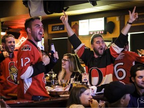 St. Louis Bar & Grill patrons cheer on the Senators during the playoffs on April 17, 2017. Errol McGihon/Postmedia