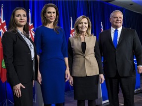 Ontario PC leadership candidates (L-R) Tanya Granic Allen, Caroline Mulroney, Christine Elliott, and Doug Ford pose for a photo following there debate in Ottawa. February 28,2018. Errol McGihon/Postmedia