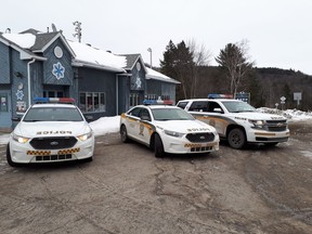 The Sûreté du Quebec released this photo of their officers visiting a tavern in Saint-Hippolyte, north of Montreal, in a province-wide initiative to end intimidation and drug trafficking in bars and taverns.