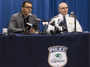 Gatineau police Chief Mario Harel, left, and Insp. Serge Guindon address the media during a news conference at their headquarters on Friday, March 16,2018.