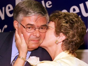 Noble Villeneuve receives a kiss from his wife Elaine after losing the provincial election in 1999 to Liberal John Cleary/
