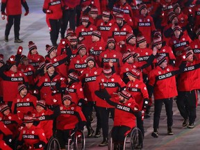 Canadian athletes walk into the opening ceremony of the Pyeongchang 2018 Paralympic Games on Friday.