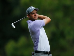 Corey Conners plays his shot from the 17th tee during the third round of the Valspar Championship on Saturday in Palm Harbor, Fla.