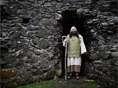 Marty Burns who plays Saint Patrick poses inside the ruins of Inch Abbey as the re-enactment of Saint Patrick's first landing in Ireland takes place at Inch Abbey on March 11, 2018 in Downpatrick, Northern Ireland. The Irish annals for the fifth century date Patrick's arrival in Ireland in the year 432. The patron saint of Ireland's remains are believed to be buried at Down Cathedral. Saint Patrick's Day is celebrated on the 17th of March.