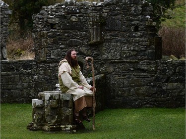 Marty Burns who plays Saint Patrick poses inside the ruins of Inch Abbey as the re-enactment of Saint Patrick's first landing in Ireland takes place at Inch Abbey on March 11, 2018 in Downpatrick, Northern Ireland. The Irish annals for the fifth century date Patrick's arrival in Ireland in the year 432. The patron saint of Ireland's remains are believed to be buried at Down Cathedral. Saint Patrick's Day is celebrated on the 17th of March.